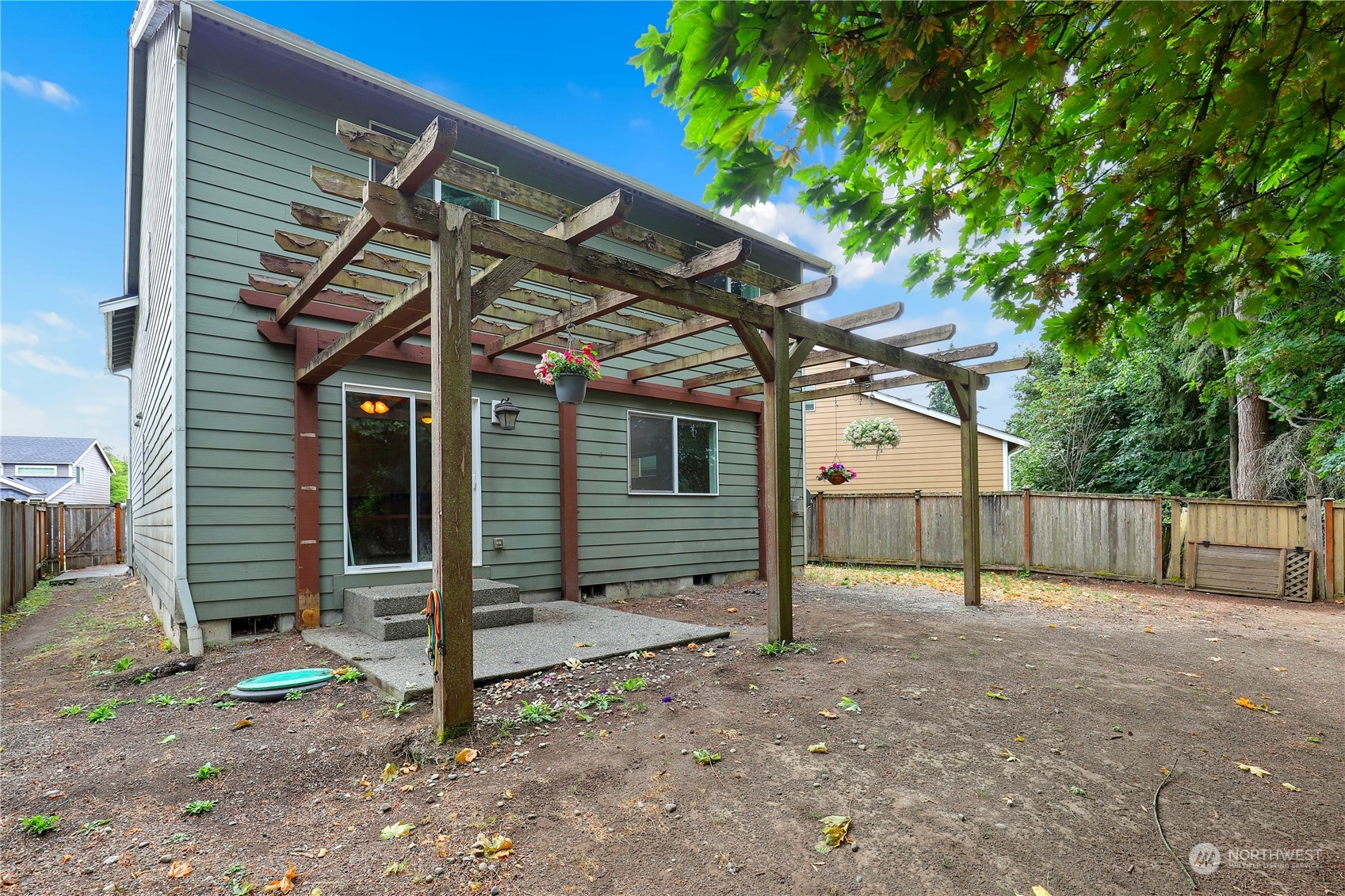 5600 55th Loop Southeast Olympia, WA 98513 - Photo 31 of 33 a view of a house with a small yard and a large tree
