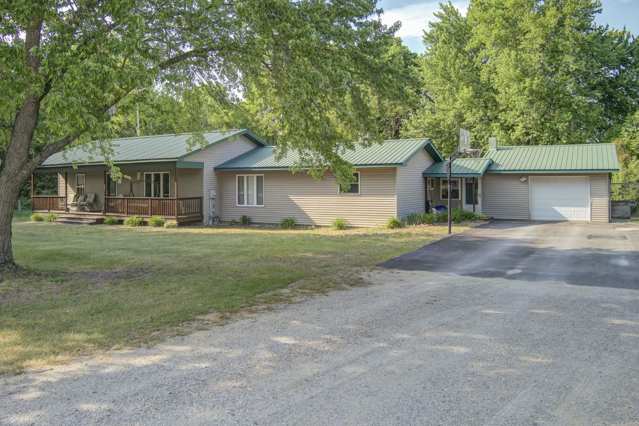 4793 East Duck Lake Road Grawn, MI 49637 - Photo 1 of 45