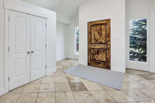 1320 Canyon Park Road Bountiful, UT 84010 - Photo 2 of 28 Entrance foyer with vaulted ceiling and light tile patterned flooring