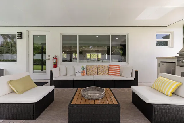 a living room with furniture and window