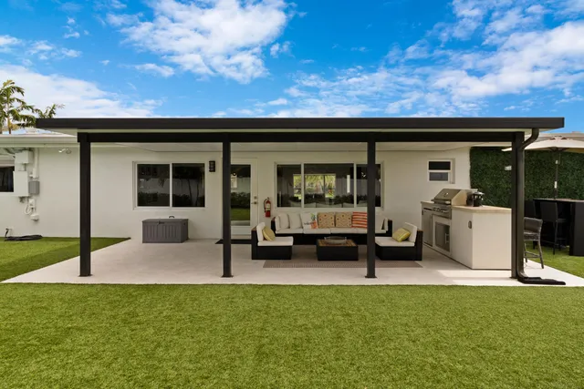 a view of a house with patio