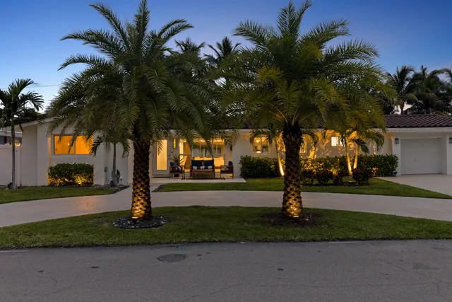 a view of a park with palm trees