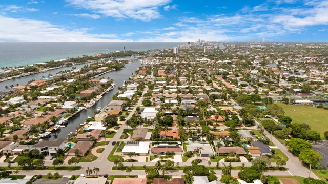 an aerial view of residential building and trees