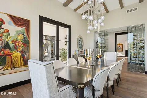 a kitchen with sink a window and cabinets