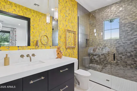 a living room with furniture and large window