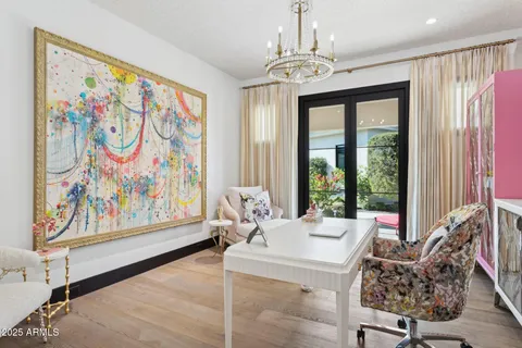 a view of a dining room with furniture and a kitchen