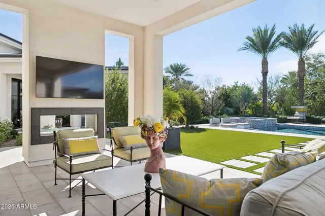 a view of a swimming pool with a patio