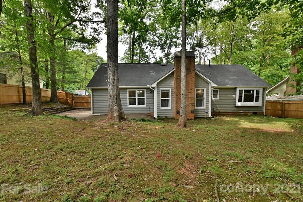 8108 Barncliff Road Charlotte, NC 28227 - Photo 25 of 25 a front view of a house with a garden
