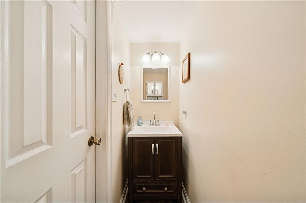 3151 Seneca Court Gibsonia, PA 15044 - Photo 12 of 38 a bathroom with a sink and a mirror