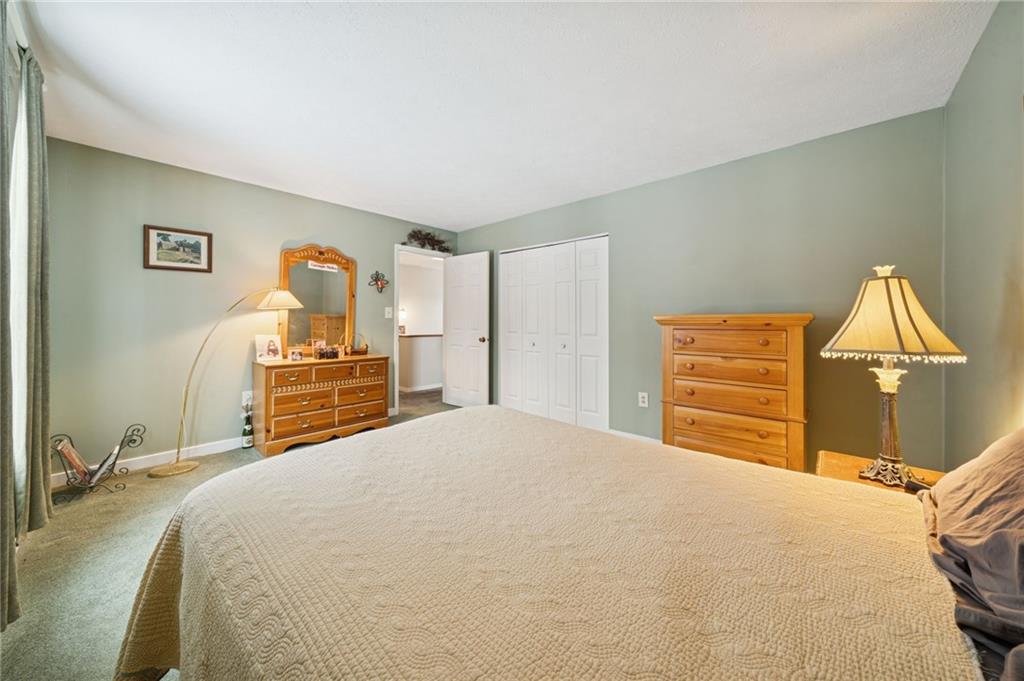 3151 Seneca Court Gibsonia, PA 15044 - Photo 20 of 38 a bedroom with a bed and a painting on the wall