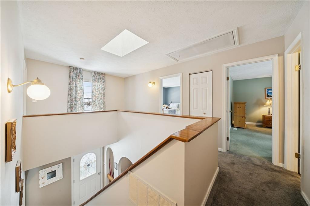 3151 Seneca Court Gibsonia, PA 15044 - Photo 22 of 38 a view of a hallway with workspace