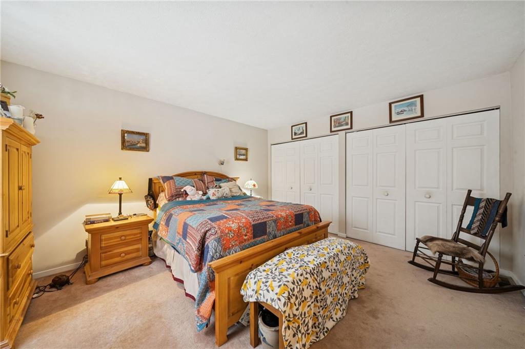 3151 Seneca Court Gibsonia, PA 15044 - Photo 23 of 38 a bedroom with a bed and a couch