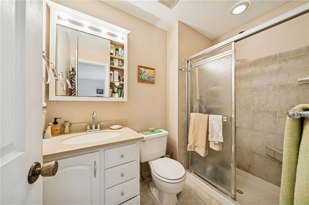 3151 Seneca Court Gibsonia, PA 15044 - Photo 24 of 38 a bathroom with a sink toilet and shower