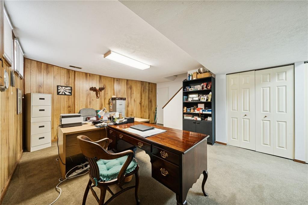 3151 Seneca Court Gibsonia, PA 15044 - Photo 26 of 38 a room with a table chairs and a refrigerator