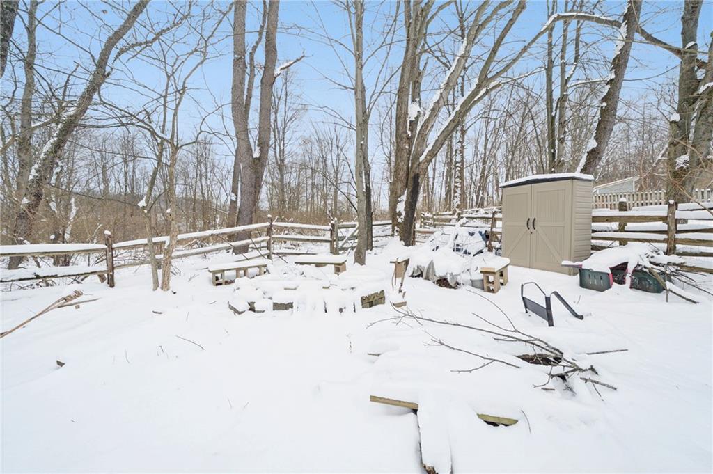 3151 Seneca Court Gibsonia, PA 15044 - Photo 33 of 38 a view of white house with a snow in the background
