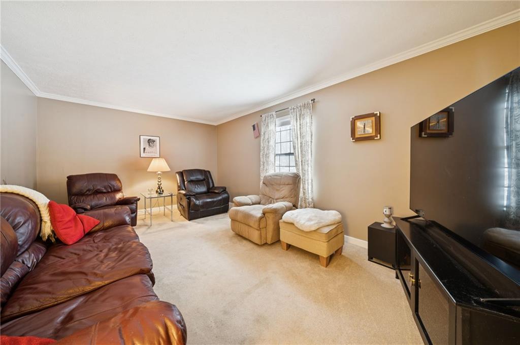 3151 Seneca Court Gibsonia, PA 15044 - Photo 9 of 38 a bedroom with furniture and a flat screen tv