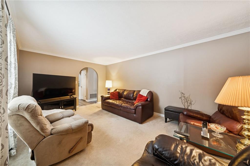 3151 Seneca Court Gibsonia, PA 15044 - Photo 10 of 38 a living room with furniture and a flat screen tv