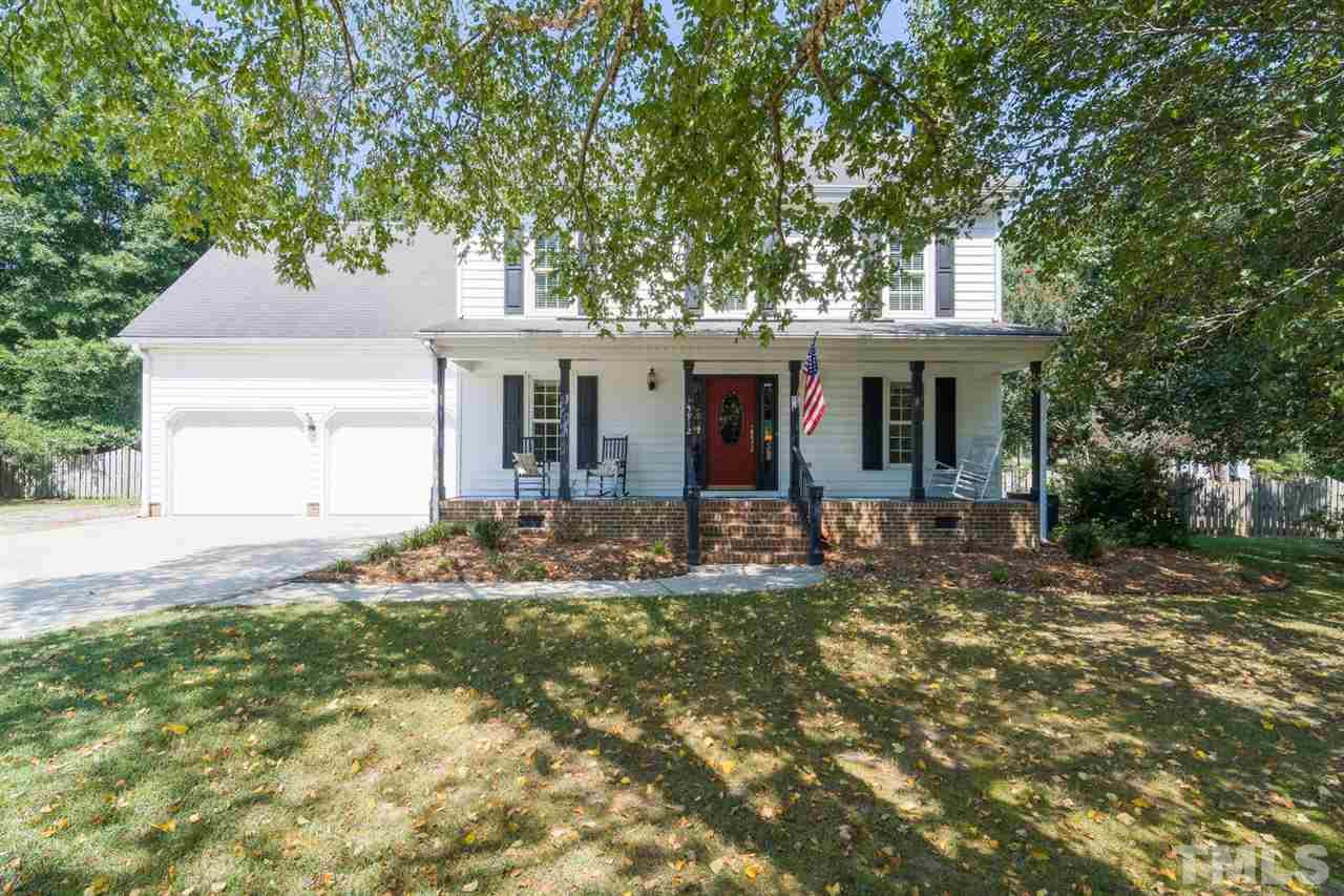 a front view of house with yard