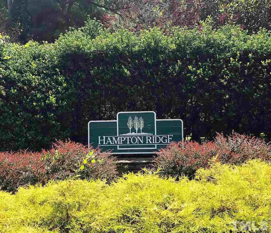 5912 Hampton Ridge Road Raleigh, NC 27603 - Photo 2 of 22 a front view of a house with a yard