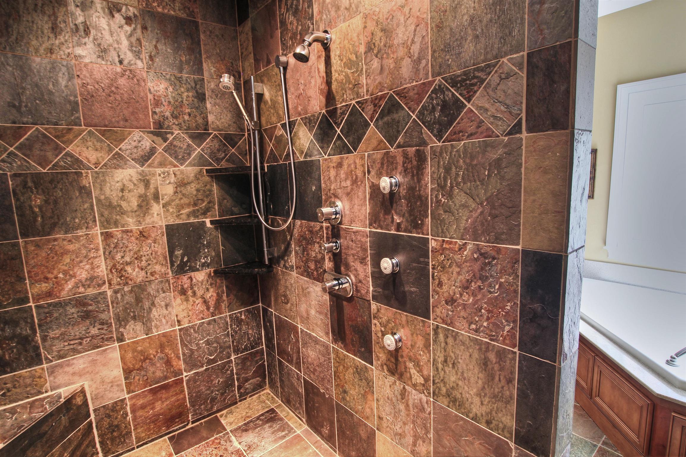 9185 Arnold Road Christiana, TN 37037 - Photo 9 of 30 Check out this walk-in slate shower with jets!