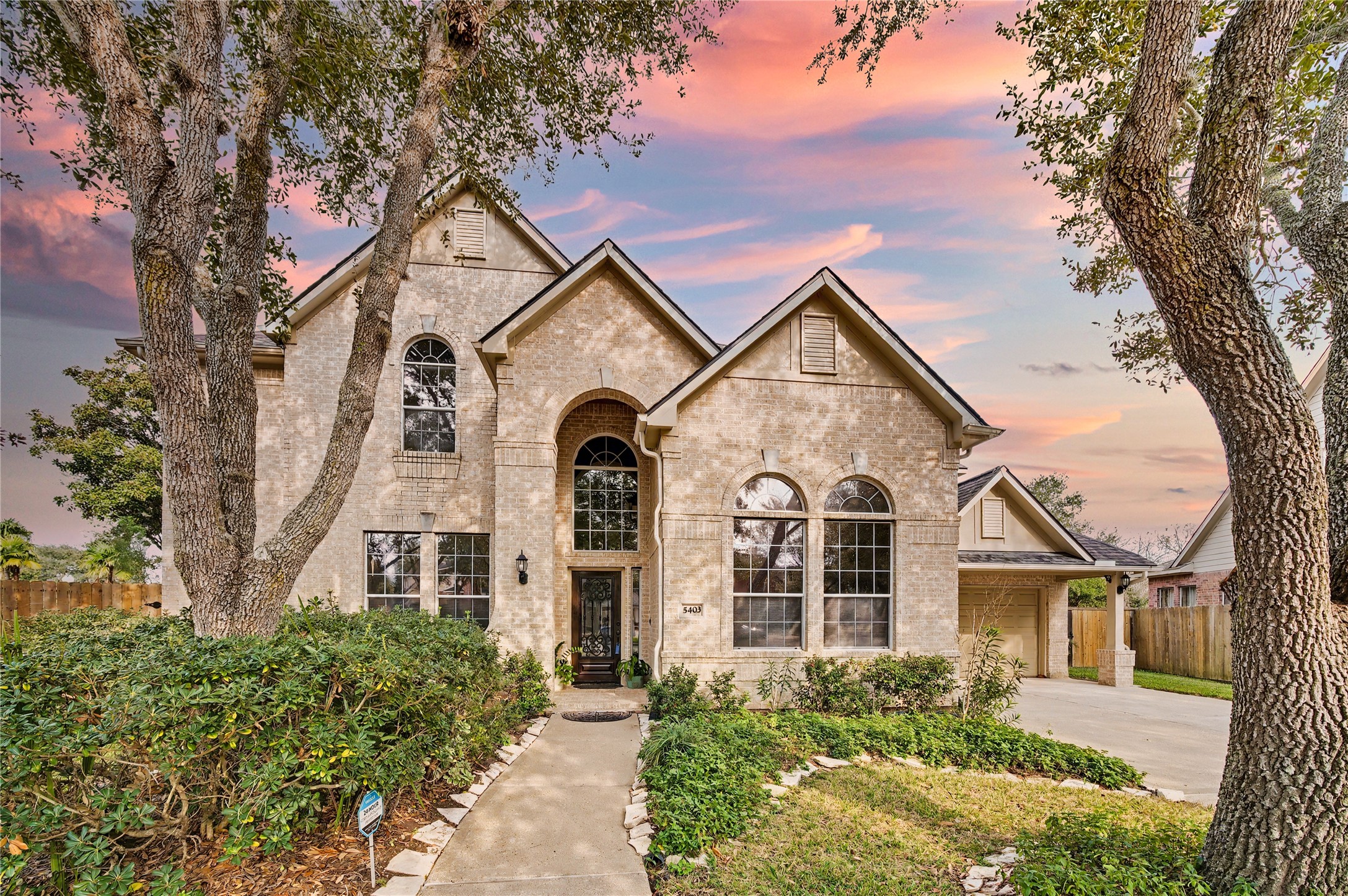5403 Emerald Pointe Lane Sugar Land, TX 77479 - Photo 3 of 50 front view of a house with a yard