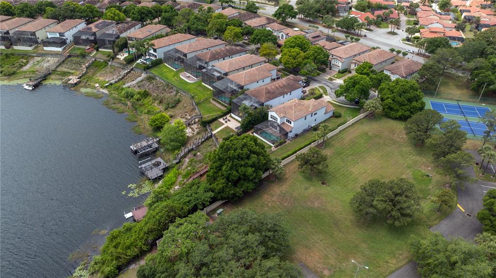8119 Vía Rosa Orlando, FL 32836 - Photo 47 of 62 an aerial view of residential houses with outdoor space and trees