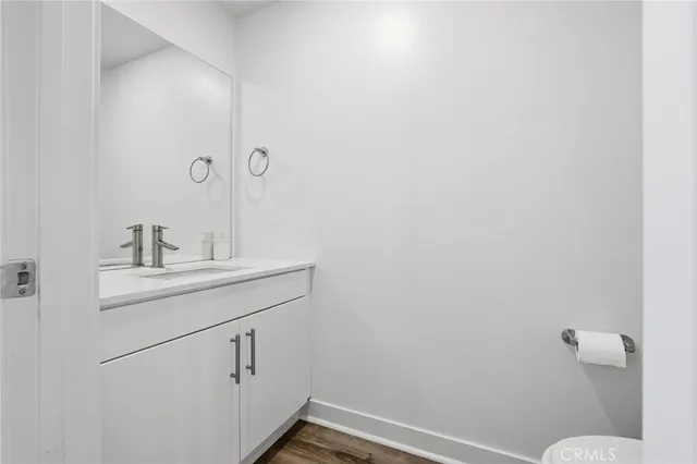 a bathroom with a sink and mirror