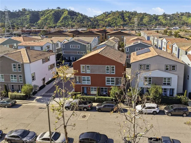 a view of a city with an ocean view