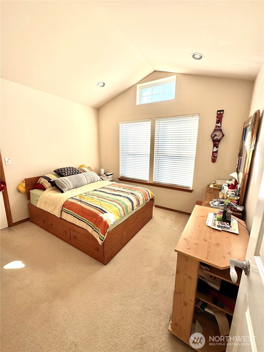 1612 Holbrook Avenue Everett, WA 98203 - Photo 17 of 23 a bedroom with a bed and wooden floor