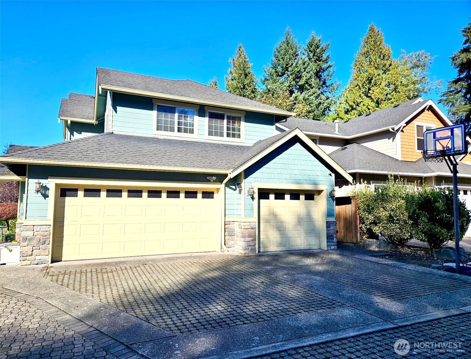 1612 Holbrook Avenue Everett, WA 98203 - Photo 2 of 23 a front view of a house with a yard and garage