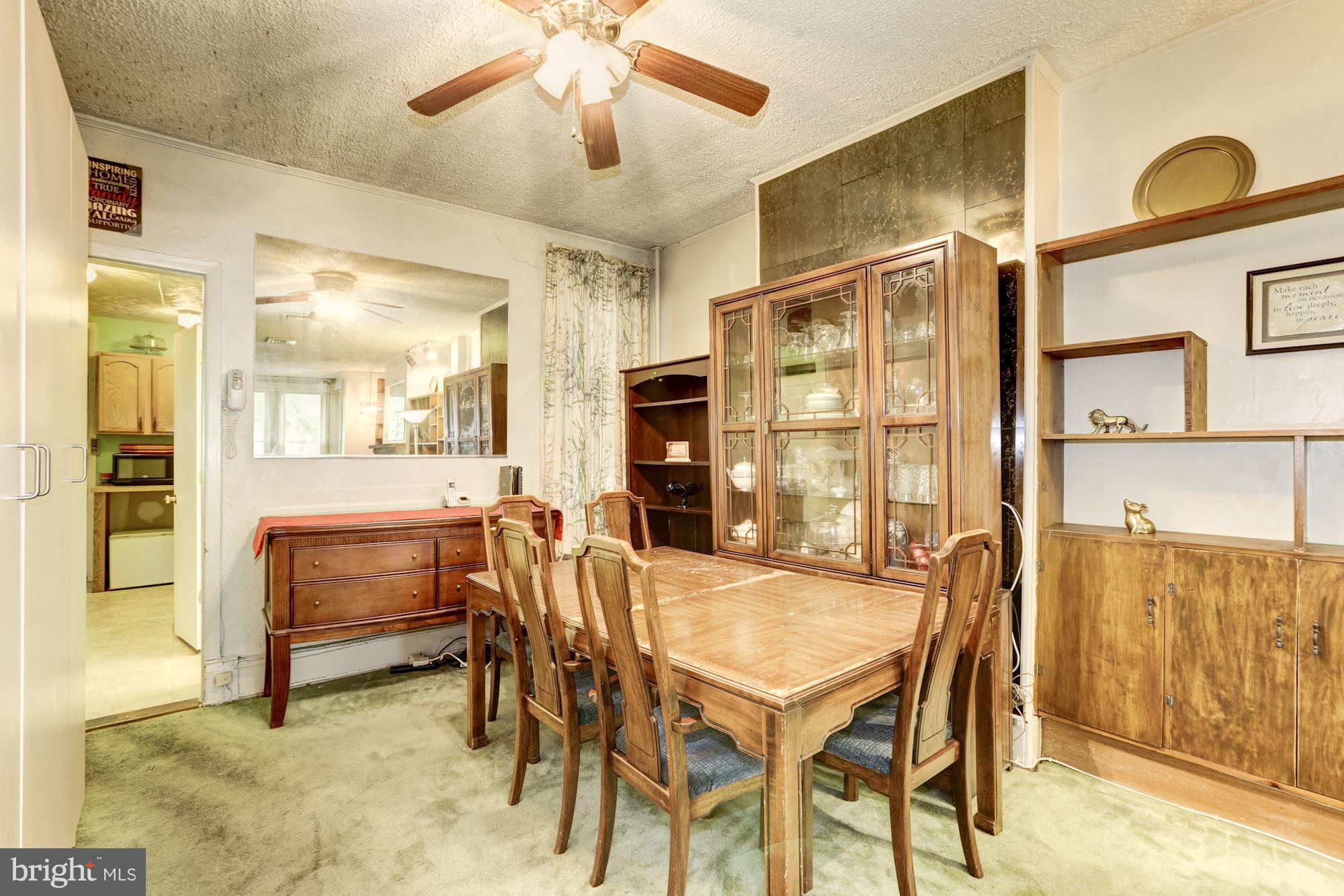 1216 D Street Northeast Washington, DC 20002 - Photo 3 of 18 a dining room with furniture and window