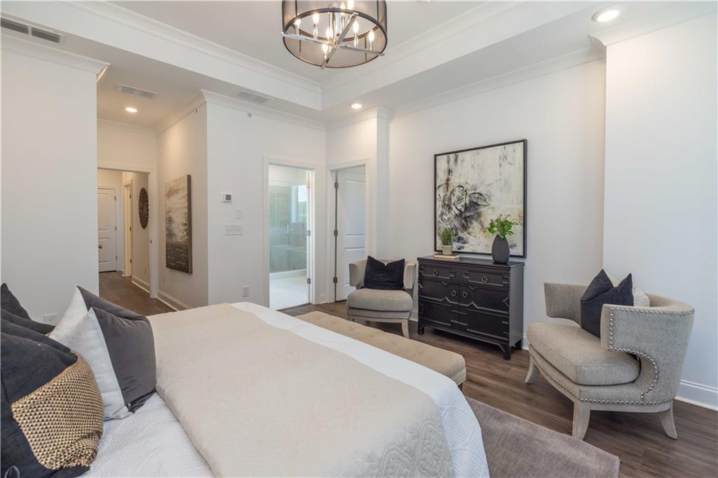 508 Whatton Road, Unit 4 Johns Creek, GA 30022 - Photo 17 of 31 a bedroom with a bed and furniture