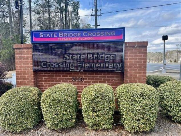 508 Whatton Road, Unit 4 Johns Creek, GA 30022 - Photo 28 of 31 a sign on the wall of building