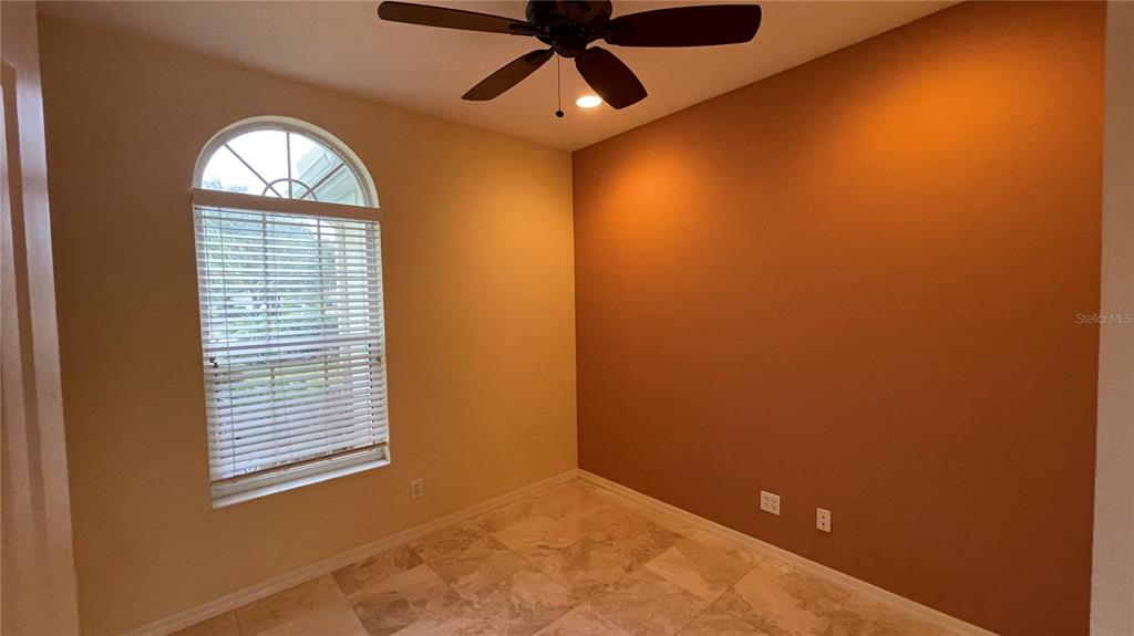 10812 Bullrush Terrace Lakewood Ranch, FL 34202 - Photo 12 of 44 an empty room with a window