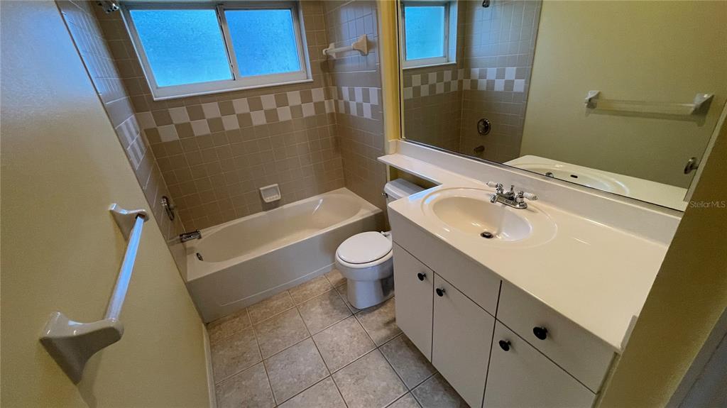 10812 Bullrush Terrace Lakewood Ranch, FL 34202 - Photo 28 of 44 a bathroom with a sink a toilet and shower