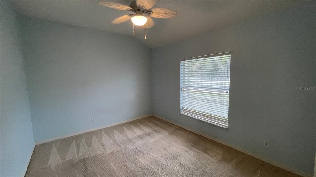 10812 Bullrush Terrace Lakewood Ranch, FL 34202 - Photo 29 of 44 an empty room with a window