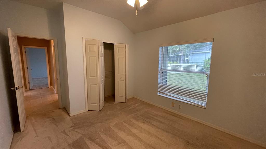 10812 Bullrush Terrace Lakewood Ranch, FL 34202 - Photo 35 of 44 an empty room with windows