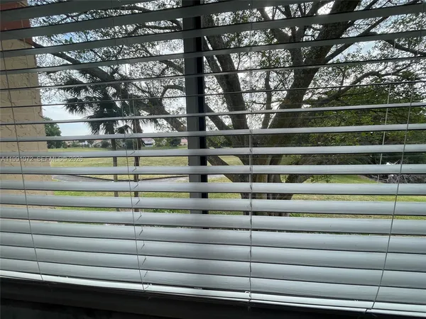 a view of a bench in a parking room