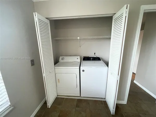 a room with storage and utility