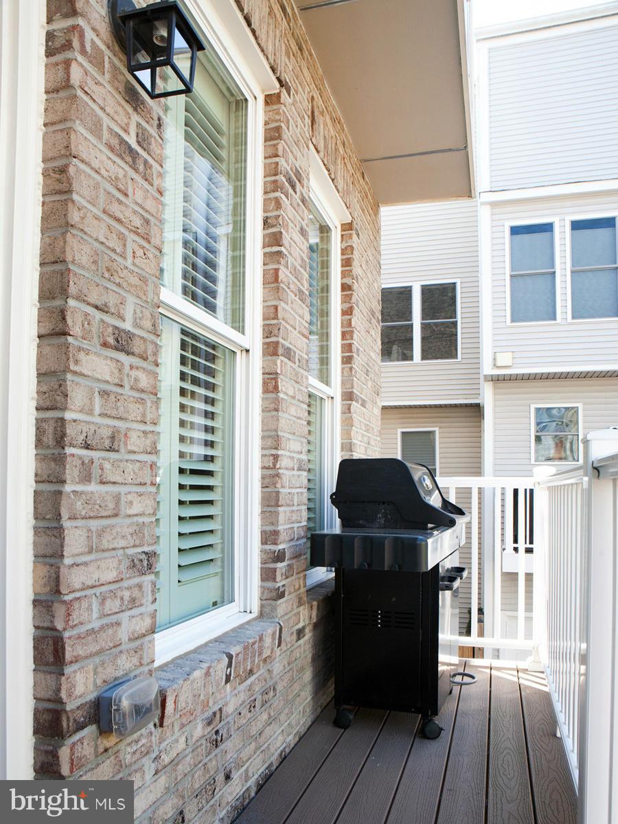 306 K Street Southeast Washington, DC 20003 - Photo 7 of 30 Main Level Living Area Balcony with Gas Grill