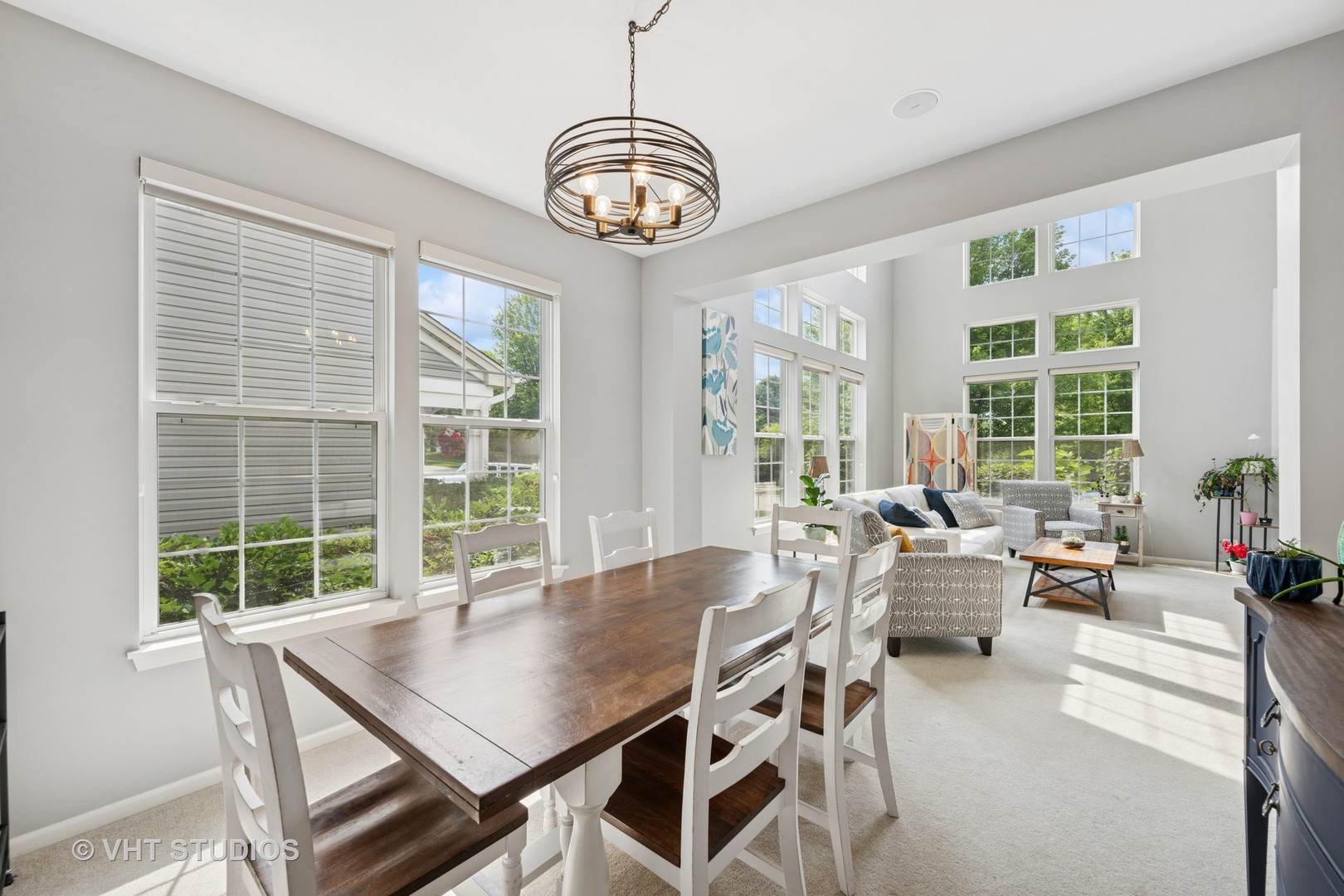 390 Sterling Circle Cary, IL 60013 - Photo 12 of 55 a view of a dining room with furniture window and outside view