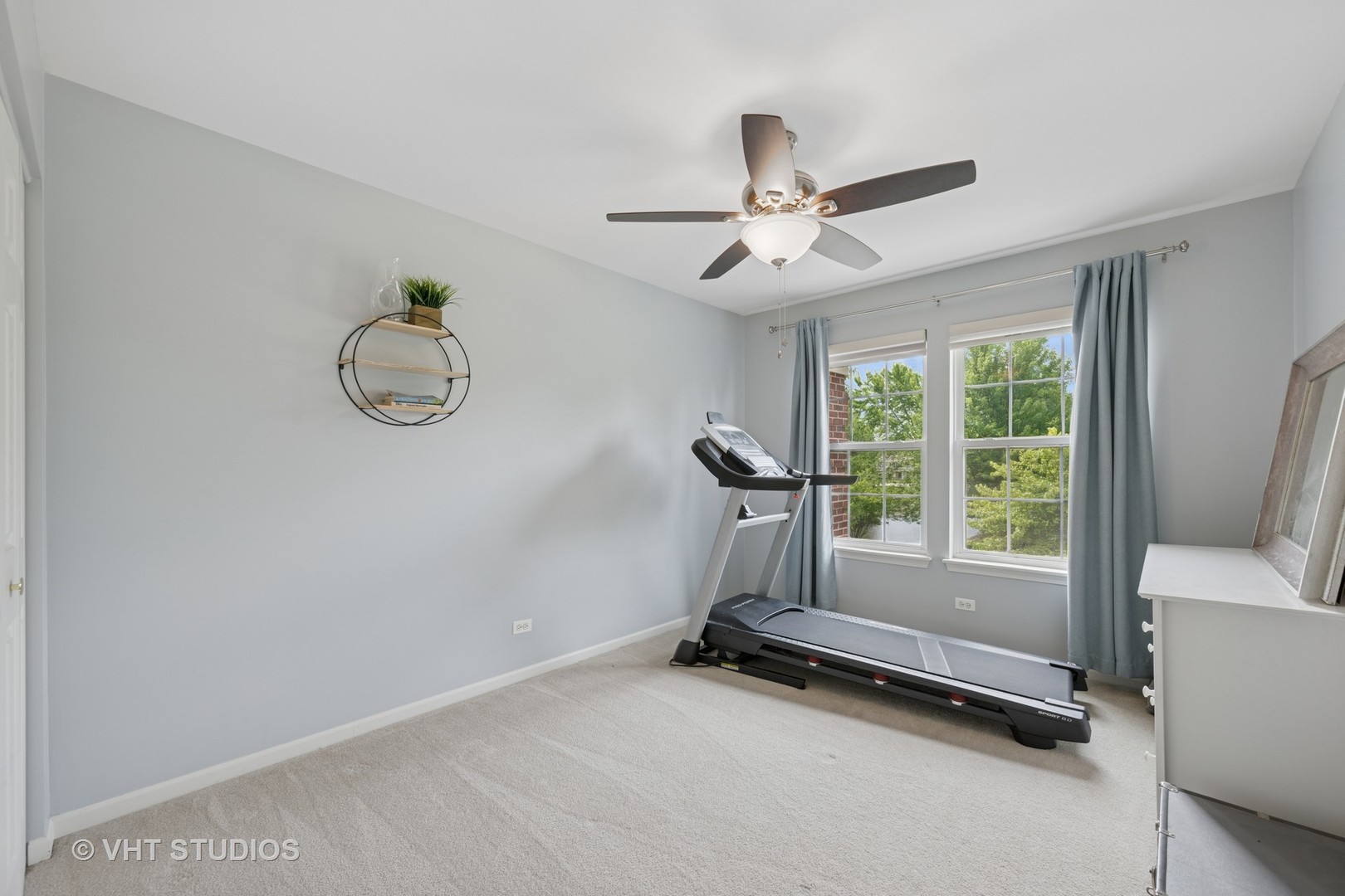 390 Sterling Circle Cary, IL 60013 - Photo 21 of 55 a view of a room with gym equipment