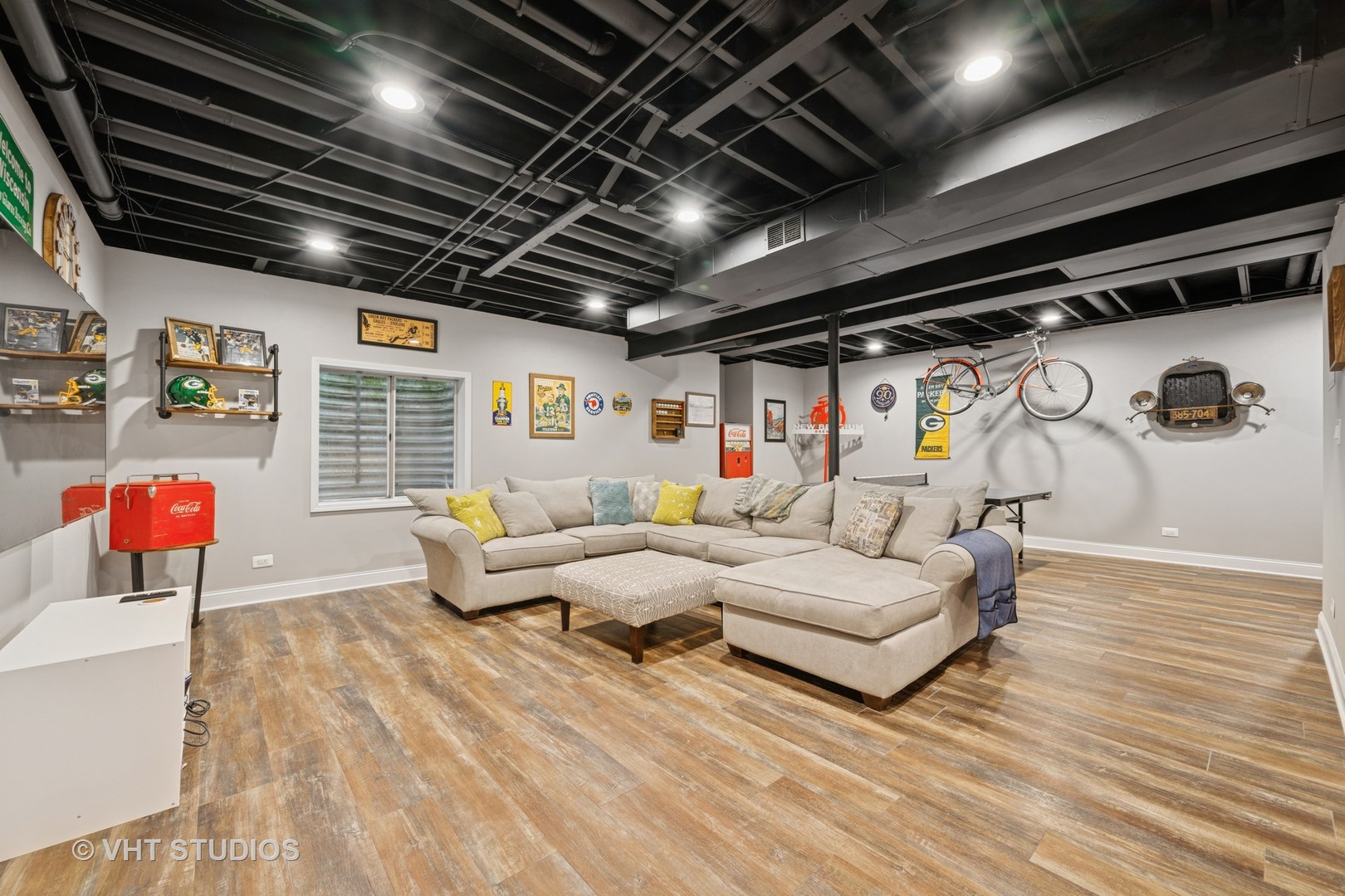 390 Sterling Circle Cary, IL 60013 - Photo 26 of 55 a living room with furniture and a chandelier