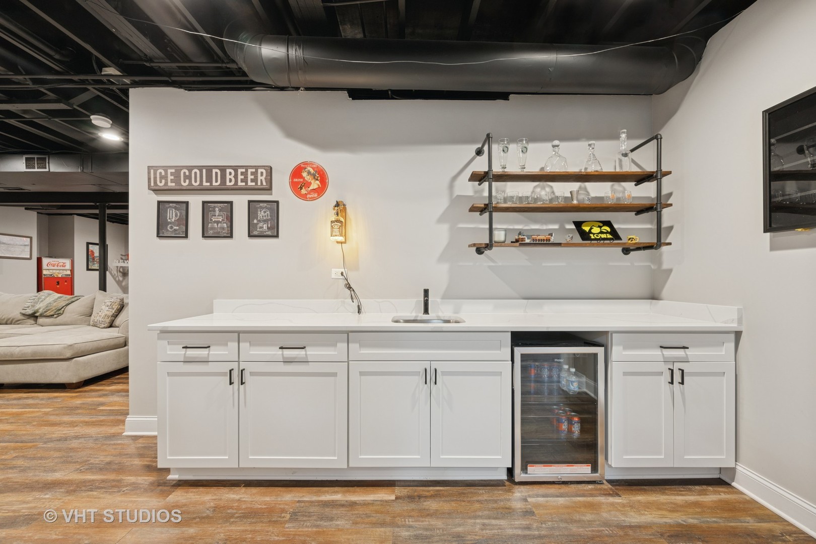 390 Sterling Circle Cary, IL 60013 - Photo 30 of 55 a kitchen with cabinets and wooden floor