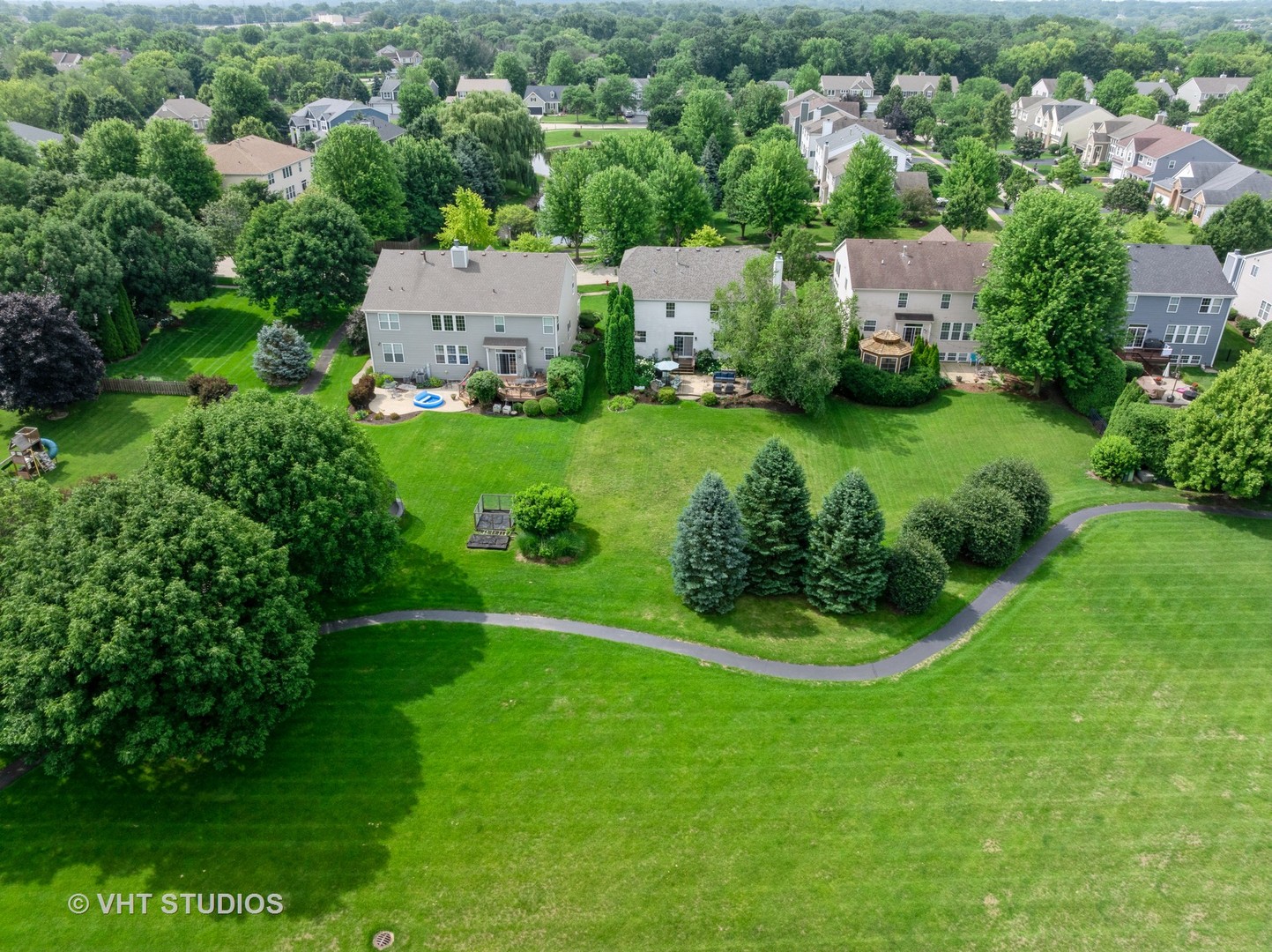 390 Sterling Circle Cary, IL 60013 - Photo 43 of 55 an aerial view of residential houses with outdoor space and trees
