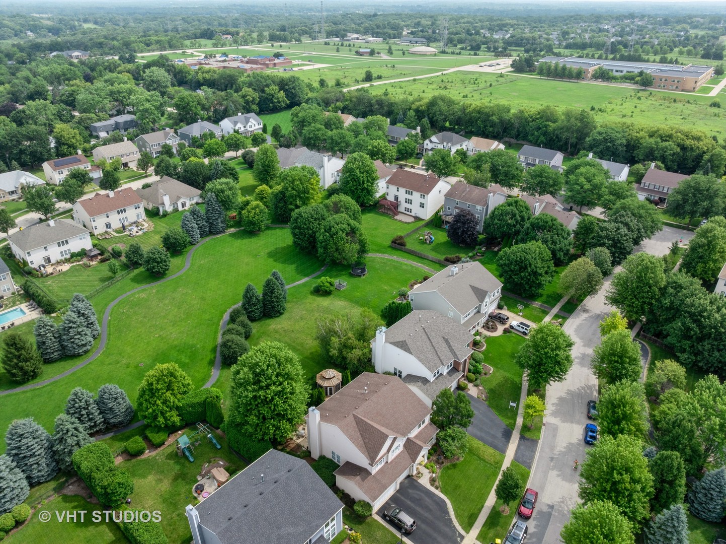 390 Sterling Circle Cary, IL 60013 - Photo 45 of 55 an aerial view of multiple houses with yard