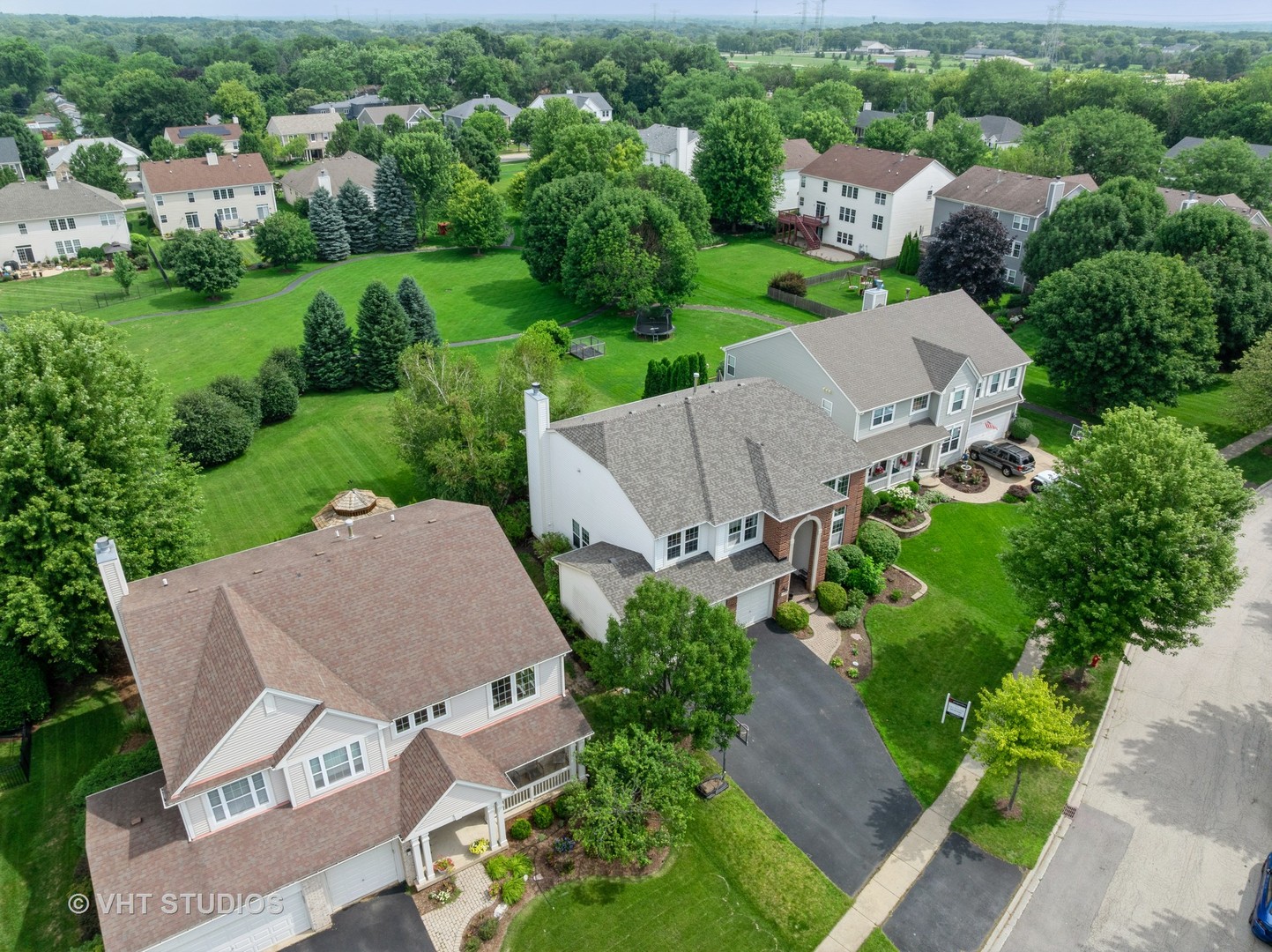 390 Sterling Circle Cary, IL 60013 - Photo 47 of 55 an aerial view of multiple houses with yard