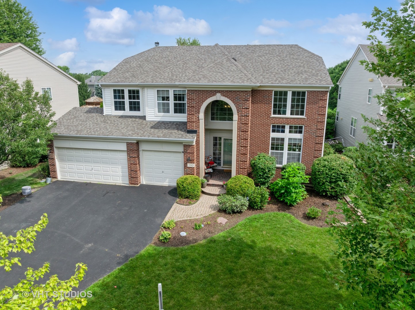 390 Sterling Circle Cary, IL 60013 - Photo 48 of 55 front view of a house with a yard