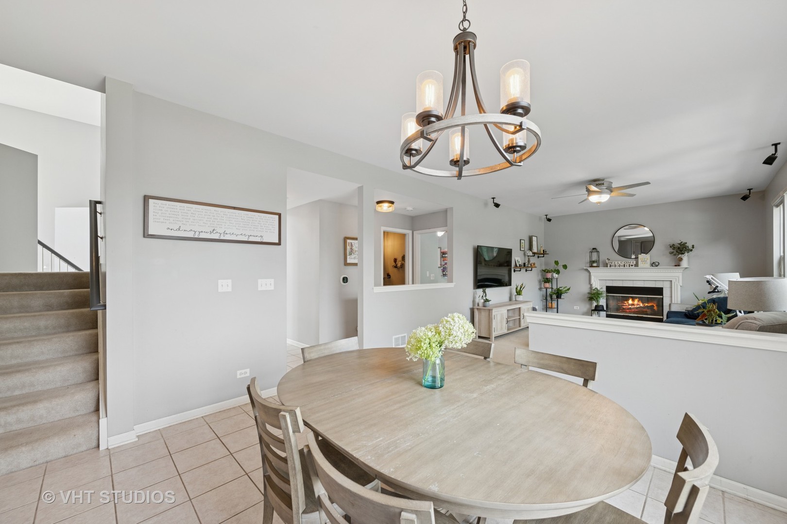 390 Sterling Circle Cary, IL 60013 - Photo 9 of 55 a view of kitchen and dining area with furniture