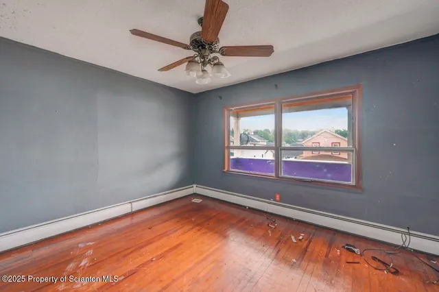 a view of a house with a back yard